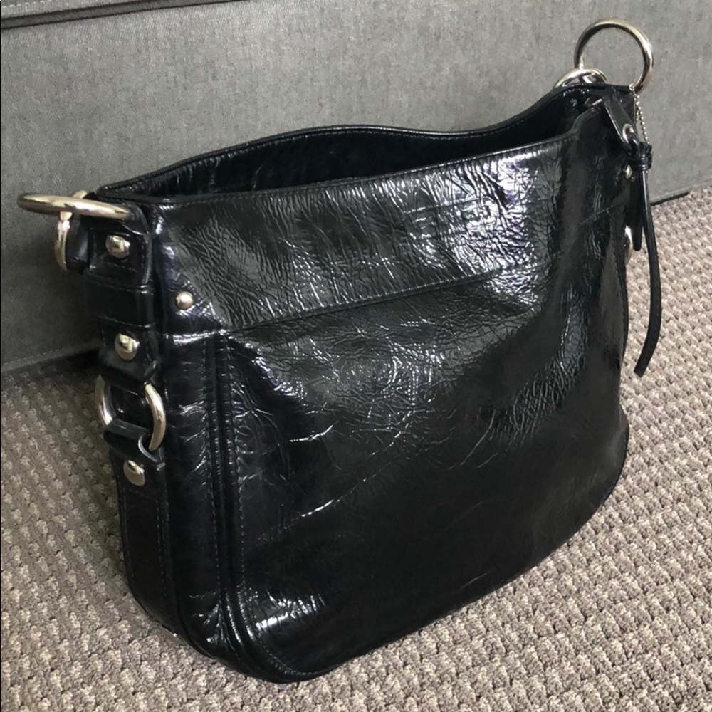 Authentic Coach - black handbag with purple lining